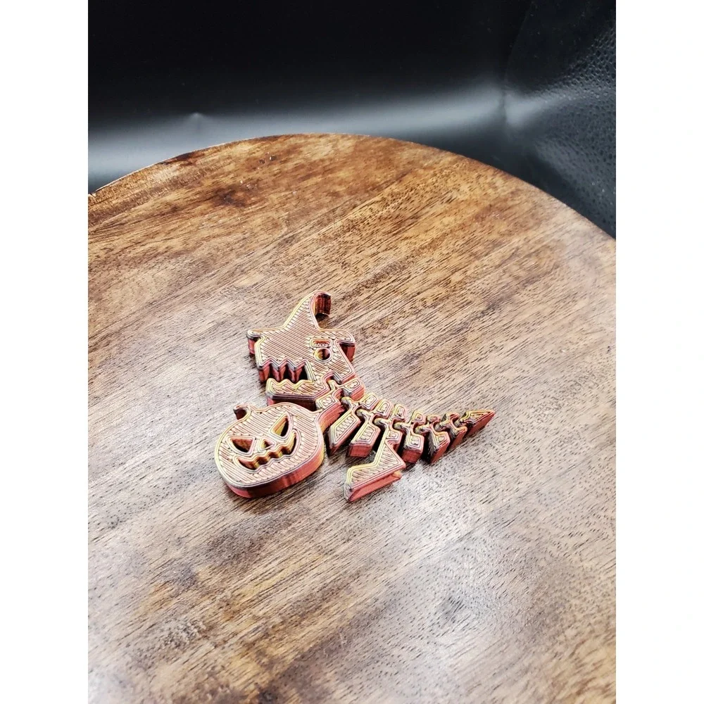 Dinosaur Pumpkin Flexi/ sensory toy/ fidget/ dinosaur jack o lantern flexi
